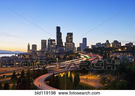 Freeways and Seattle skyline at sunset, Seattle, Washington, United States View Large Photo Image Stock Photo - Freeways and Seattle skyline at sunset, Seattle, Washington, United States. Fotosearch