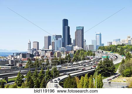 Stock Photograph - Freeways and Seattle skyline, Seattle, Washington, United States. Fotosearch