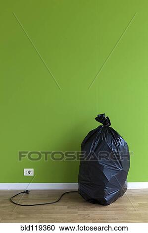 Stock Image - Garbage bag with plug and outlet. Fotosearch