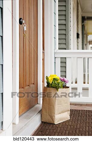 Grocery bag on front stoop View Large Photo Image Stock Image - Grocery bag on front stoop. Fotosearch