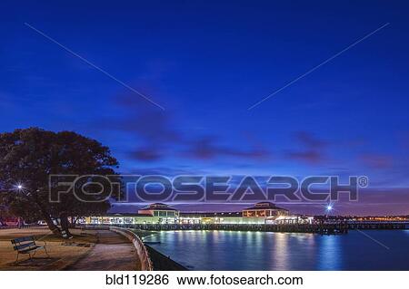 Harbor lit up at dawn View Large Photo Image Stock Photograph - Harbor lit up at dawn. Fotosearch