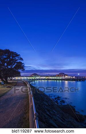 Harbor lit up at night View Large Photo Image Stock Photo - Harbor lit up at night. Fotosearch