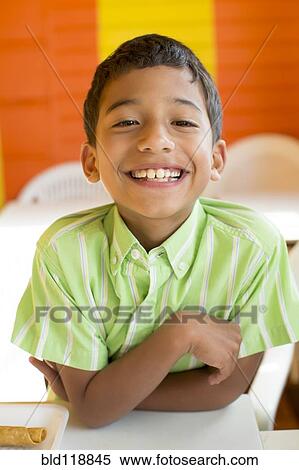 Stock Photography - Hispanic boy smiling. Fotosearch