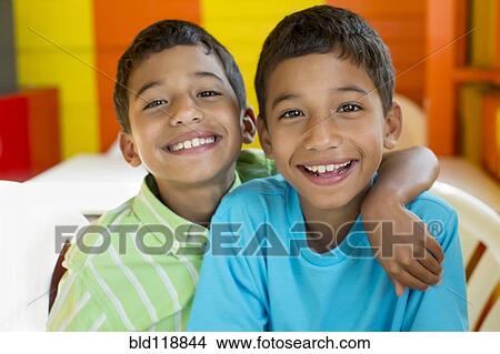 Picture - Hispanic boys smiling together. Fotosearch