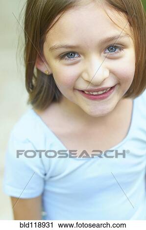 Hispanic girl smiling outdoors View Large Photo Image Stock Image - Hispanic girl smiling outdoors. Fotosearch