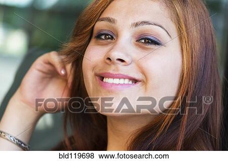 Hispanic girl smiling View Large Photo Image Stock Photo - Hispanic girl smiling. Fotosearch