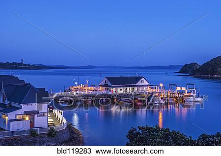Illuminated building on water at dawn View Large Photo Image Stock Image - Illuminated building on water at dawn. Fotosearch