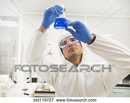 Stock Photo - Indian scientist working in laboratory. Fotosearch