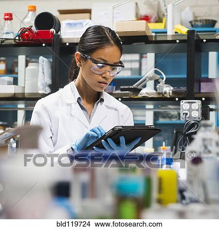 Japanese scientist working in laboratory View Large Photo Image Picture - Japanese scientist working in laboratory. Fotosearch
