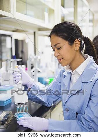 Stock Photograph - Japanese scientist working in laboratory. Fotosearch