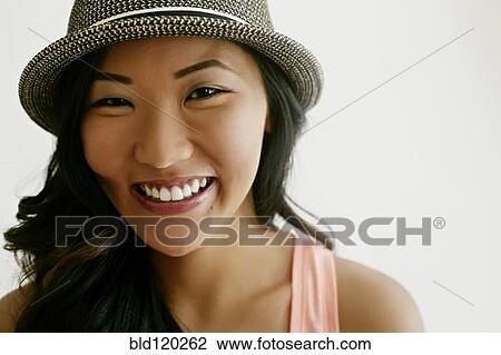 Stock Image - Korean woman smiling. Fotosearch