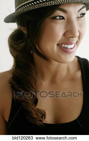 Stock Image - Korean woman smiling. Fotosearch