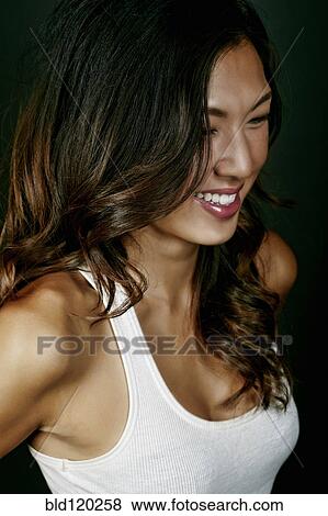 Korean woman smiling View Large Photo Image Stock Photo - Korean woman smiling. Fotosearch
