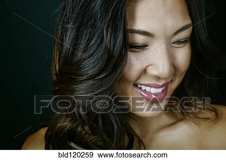 Stock Photo - Korean woman smiling. Fotosearch
