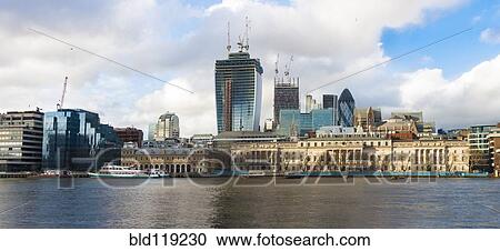 Stock Image - London skyline on waterfront, London, United Kingdom. Fotosearch