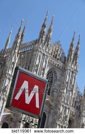 Stock Image - M' sign outside ornate church. Fotosearch