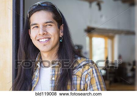 Stock Photo - Mixed race man smiling. Fotosearch