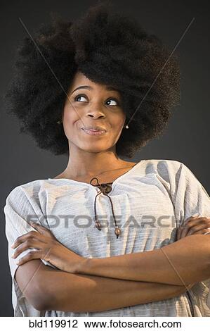 Mixed race woman smiling View Large Photo Image Stock Image - Mixed race woman smiling. Fotosearch