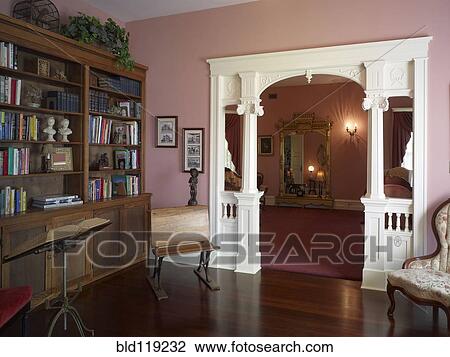 Stock Image - Ornate archway in library of Hulbert Mansion, Aberdeen, Washington, United States. Fotosearch