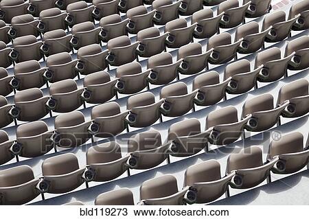 Stock Image - Overhead view of empty auditorium seats. Fotosearch