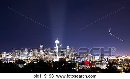 Stock Image - Seattle skyline lit up at night, Seattle, Washington, United States. Fotosearch