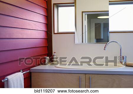 Stock Photo - Sink and mirror in modern bathroom. Fotosearch