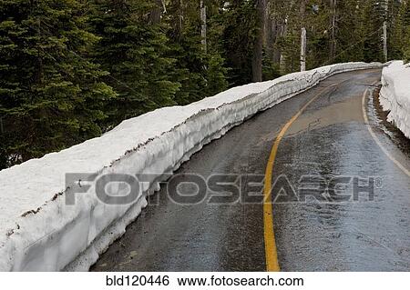 Snow piled up by rural road View Large Photo Image Stock Photograph - Snow piled up by rural road. Fotosearch