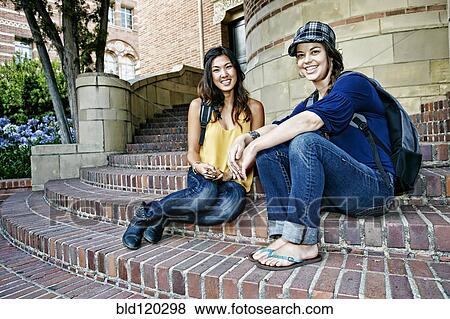 Students talking on campus steps View Large Photo Image Stock Photo - Students talking on campus steps. Fotosearch