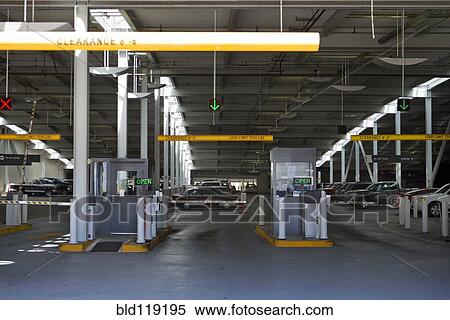 Toll booths at entrance to parking garage View Large Photo Image Stock Photography - Toll booths at entrance to parking garage. Fotosearch