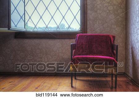 Velvet throw on empty chair View Large Photo Image Picture - Velvet throw on empty chair. Fotosearch
