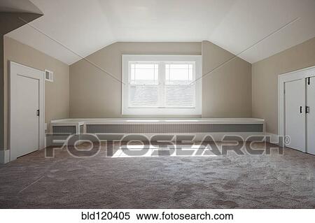 Stock Photography - Window in empty attic room. Fotosearch