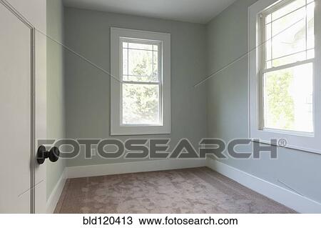 Stock Image - Windows in empty room. Fotosearch
