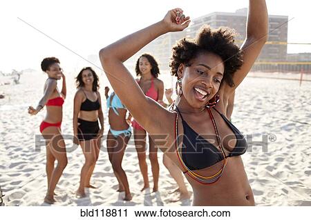 Woman dancing on beach View Large Photo Image Stock Image - Woman dancing on beach. Fotosearch