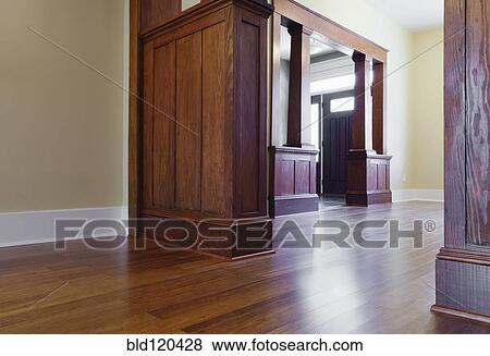 Woodwork and hardwood floor in empty house View Large Photo Image Stock Photo - Woodwork and hardwood floor in empty house. Fotosearch