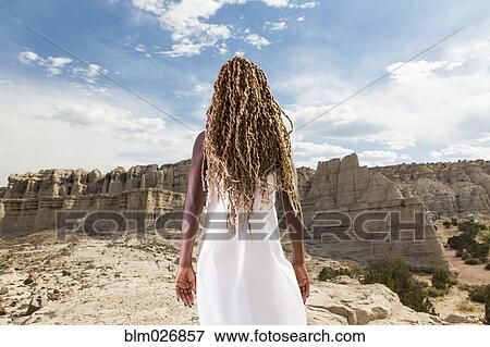 African American woman examining rock formations, Santa Fe, New Mexico, United States View Large Photo Image Stock Photo - African American woman examining rock formations, Santa Fe, New Mexico, United States. Fotosearch