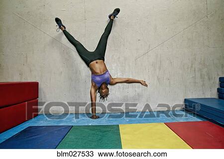 African American woman exercising in gym View Large Photo Image Stock Image - African American woman exercising in gym. Fotosearch