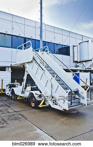 Airplane staircase on runway View Large Photo Image Stock Photo - Airplane staircase on runway. Fotosearch