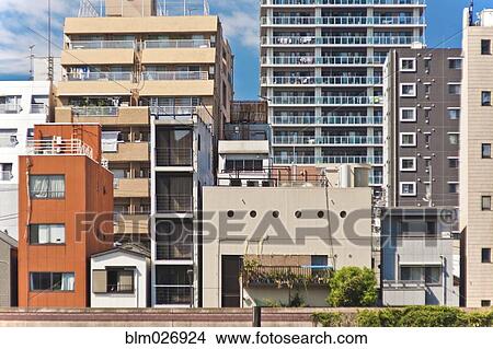 Apartment buildings on city street, Tokyo, Japan View Large Photo Image Picture - Apartment buildings on city street, Tokyo, Japan. Fotosearch