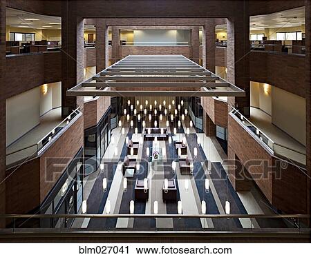 Stock Image - Balcony view of office lobby area. Fotosearch