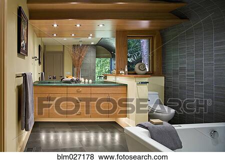 Bathtub, toilet and sink in modern bathroom View Large Photo Image Stock Photo - Bathtub, toilet and sink in modern bathroom. Fotosearch