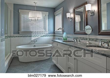 Bathtub, toilet and sink in modern bathroom View Large Photo Image Stock Photo - Bathtub, toilet and sink in modern bathroom. Fotosearch