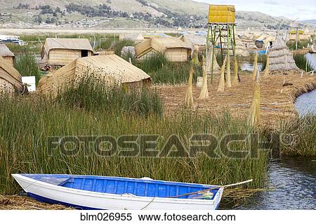 Boat mooring in lake by rural village, Lake Titicaca, Peru View Large Photo Image Stock Photography - Boat mooring in lake by rural village, Lake Titicaca, Peru. Fotosearch