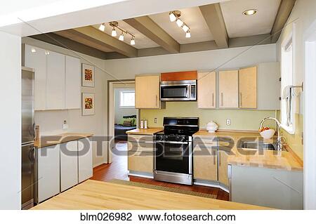 Cabinets and stove in modern craftsman kitchen View Large Photo Image Stock Image - Cabinets and stove in modern craftsman kitchen. Fotosearch