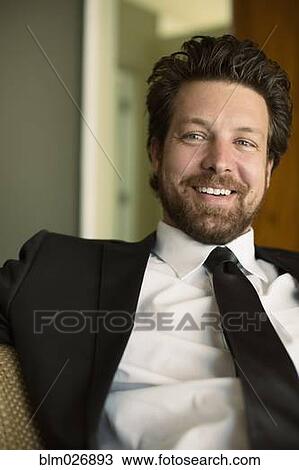 Caucasian businessman smiling View Large Photo Image Stock Image - Caucasian businessman smiling. Fotosearch