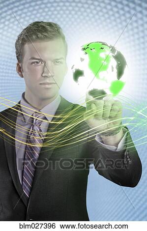 Caucasian businessman with glowing globe View Large Photo Image Stock Photograph - Caucasian businessman with glowing globe. Fotosearch