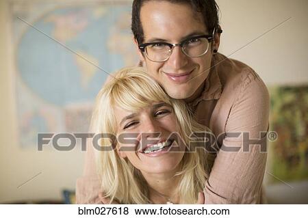 Stock Photo - Caucasian couple hugging. Fotosearch