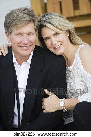 Caucasian couple hugging View Large Photo Image Stock Photography - Caucasian couple hugging. Fotosearch