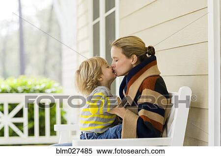 Caucasian mother and son kissing View Large Photo Image Stock Photography - Caucasian mother and son kissing. Fotosearch