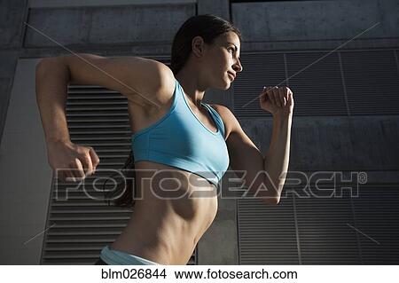 Caucasian woman running View Large Photo Image Picture - Caucasian woman running. Fotosearch
