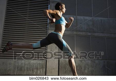 Caucasian woman running View Large Photo Image Stock Image - Caucasian woman running. Fotosearch